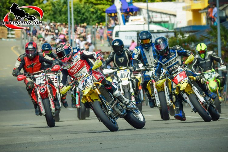 The Supermoto class is sure to be a crowd favourite on the public streets of Whanganui on Boxing Day, especially if UK rider Davey Todd (Suzuki RM-Z450 letter D) and local hero Richie Dibben (Suzuki RM-Z450 No.1) have anything to do with it. This is an image from the Cemetery Circuit last season. Photo by Andy McGechan